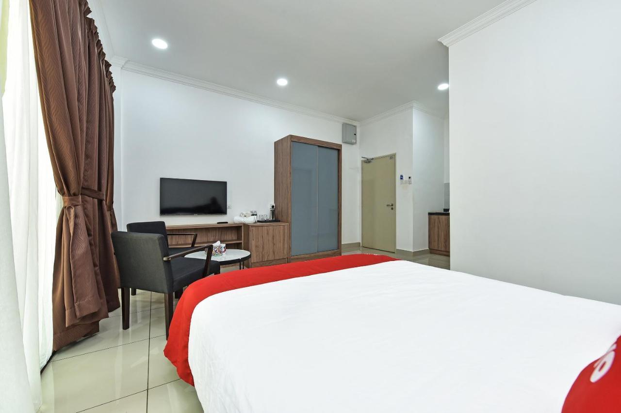 Capital O 90614 Cvia Ummul Hotel Padang Besar Exterior photo